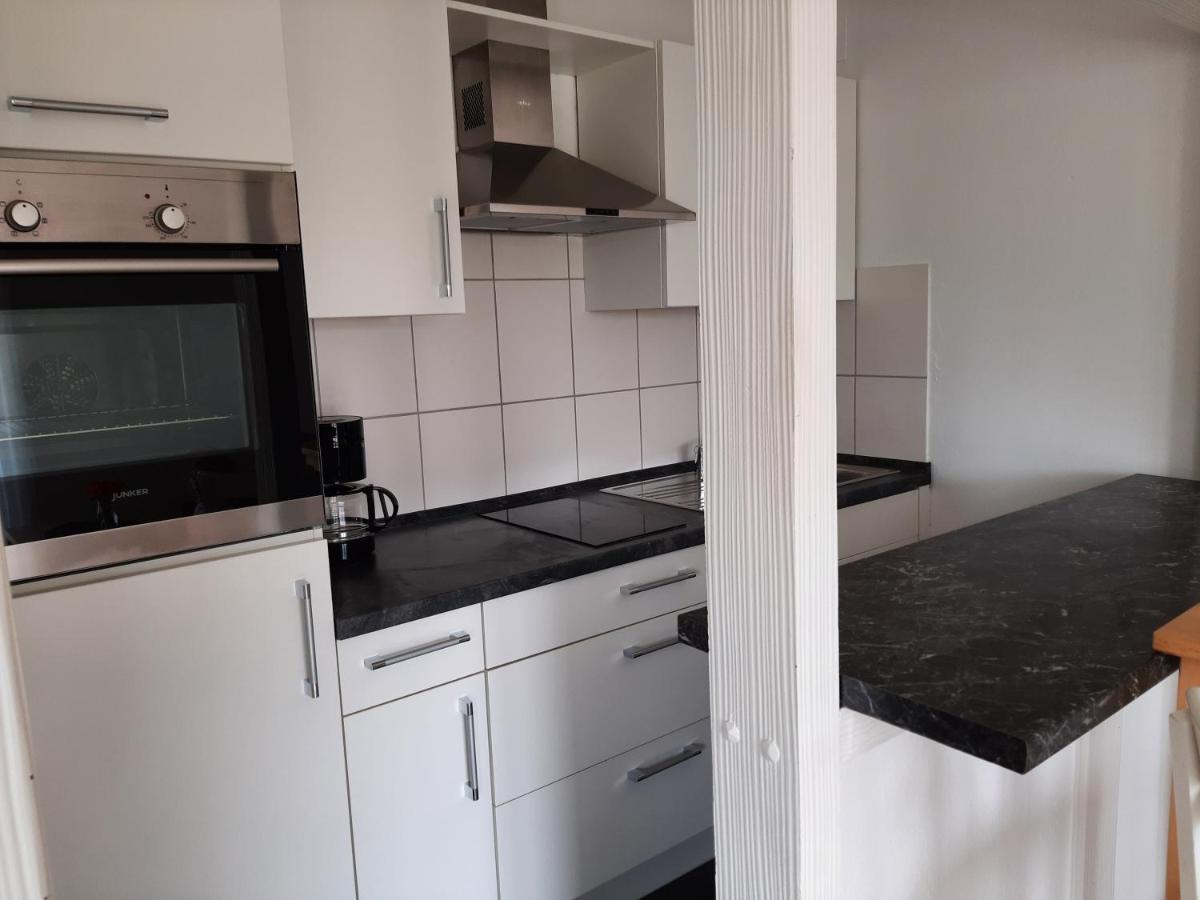 Moderne Wohnung Im Grunen Mit Schoner Terasse เทตต์นัง ภายนอก รูปภาพ